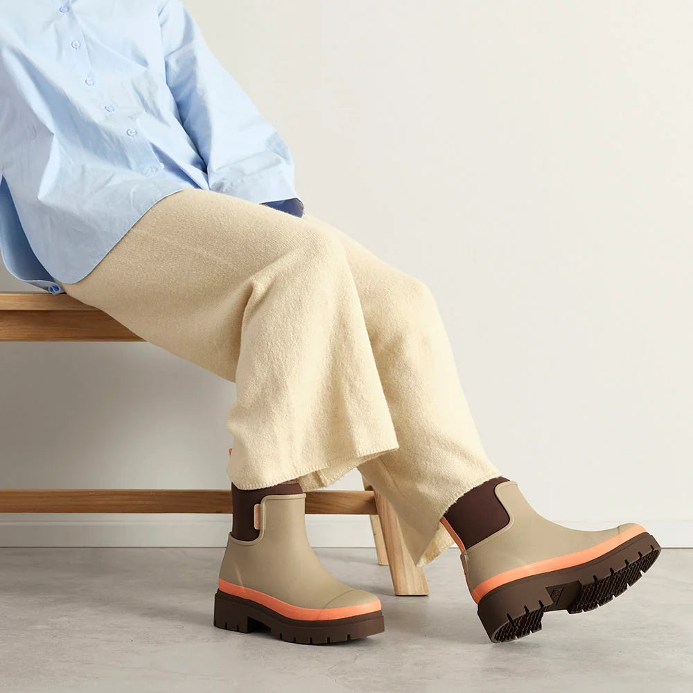 Merry People Tully wellington boot in Taupe & Apricot, worn on body