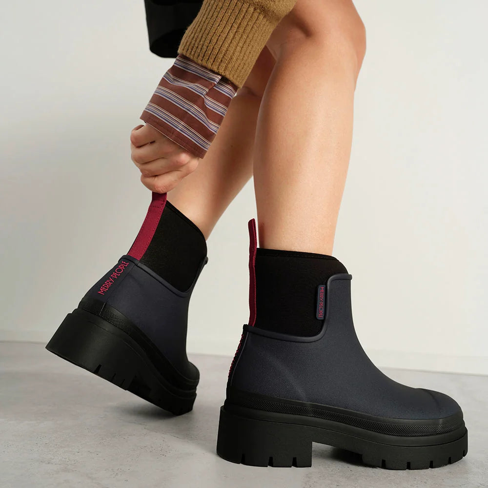 Merry People Tully wellington boot in Midnight, worn on body