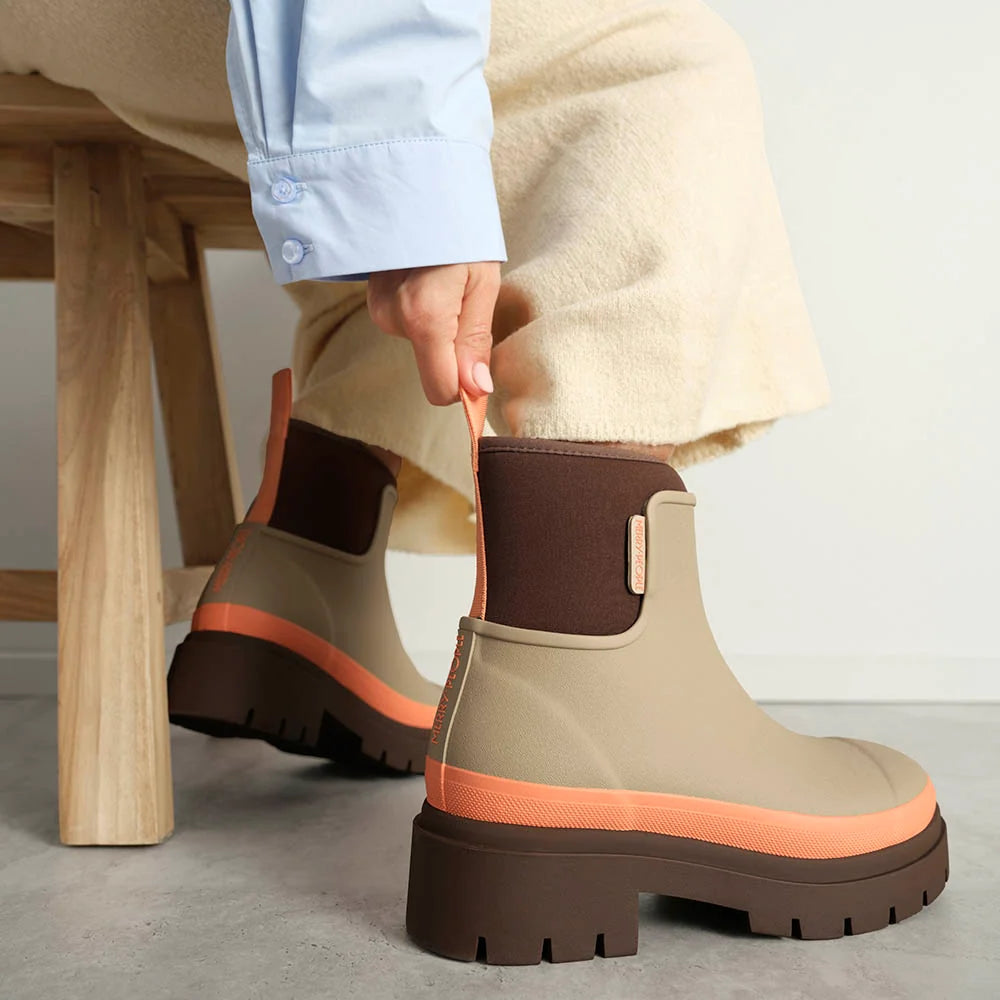 Merry People Tully wellington boot in Taupe & Apricot, worn on body
