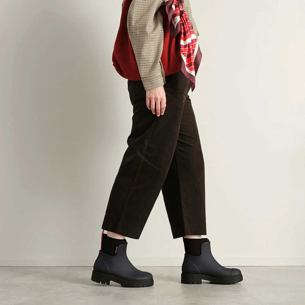 Merry People Tully wellington boot in Midnight, worn on body