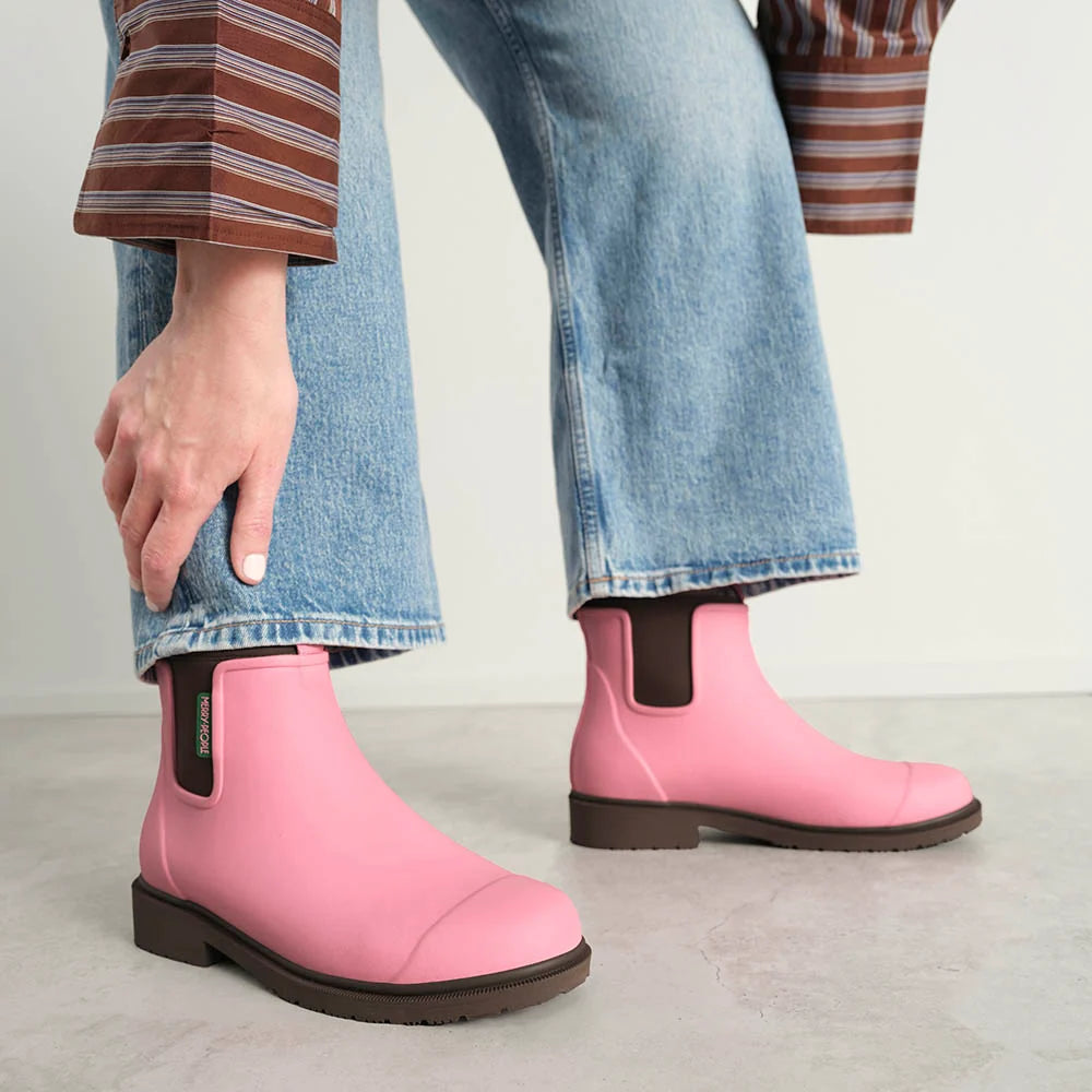 Merry People Bobbi wellington boot in Musk Pink, worn on body