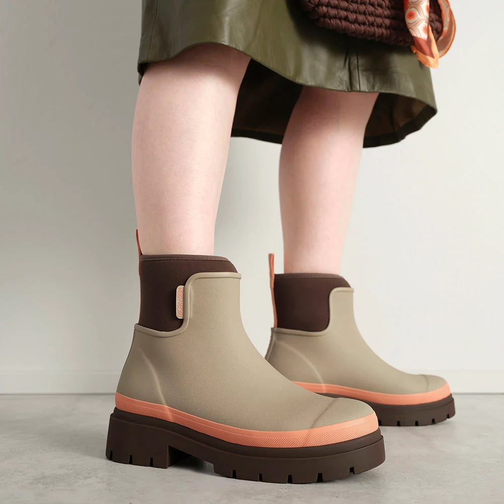 Merry People Tully wellington boot in Taupe & Apricot, worn on body