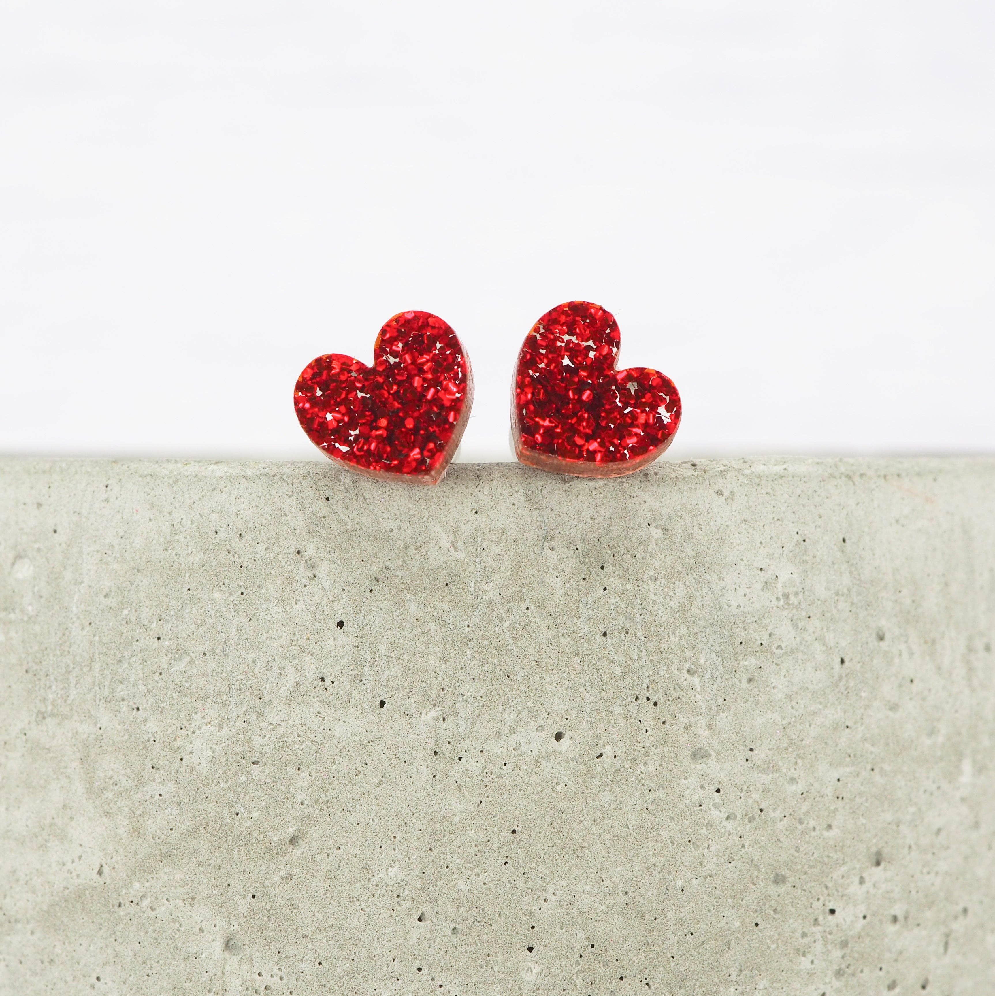Red glitter small heart acrylic studs