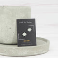 Glow in the dark 7 point star studs