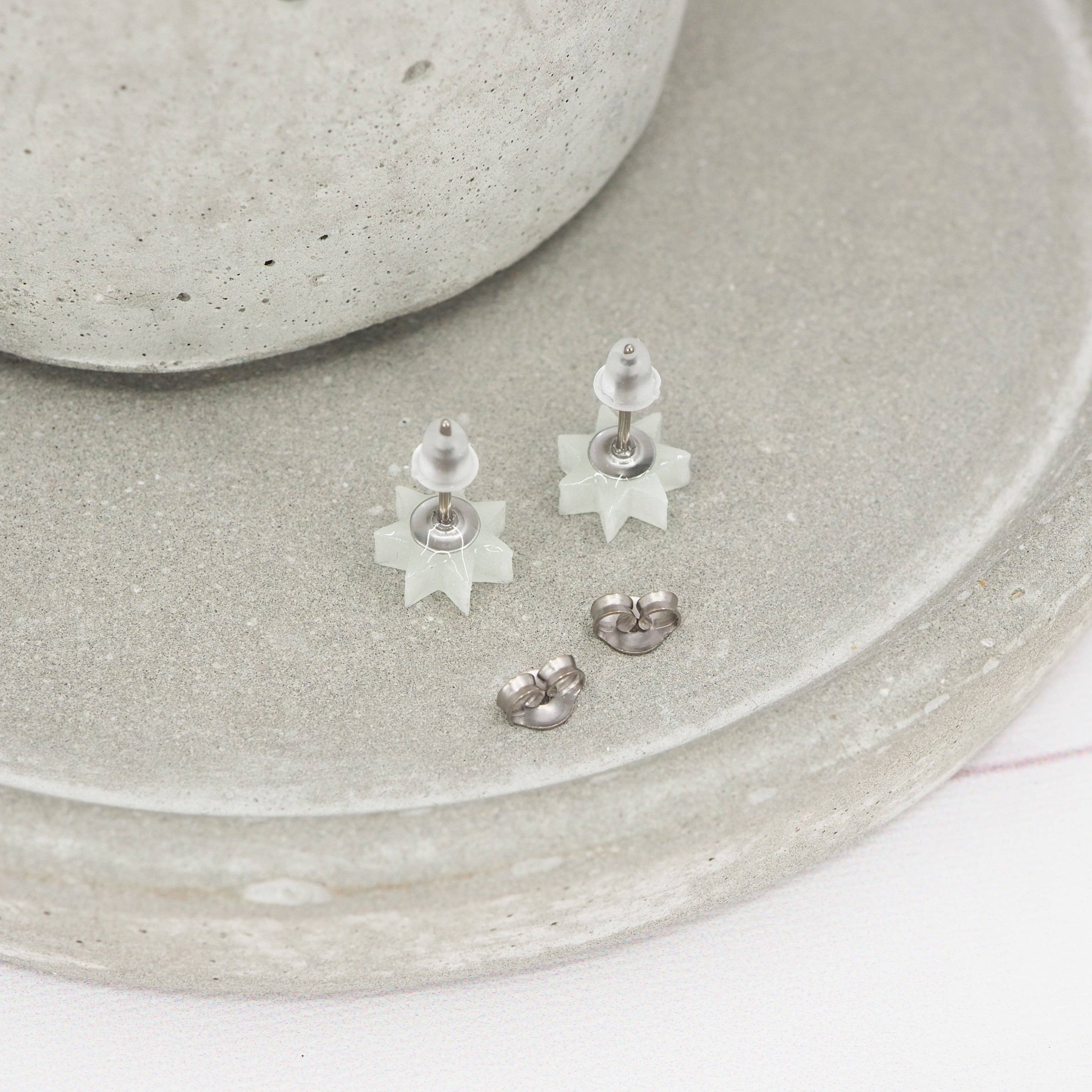 Glow in the dark 7 point star studs
