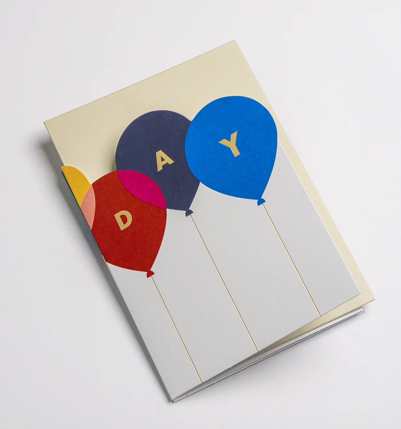 Lagom Design Birthday Concertina Card with "'Happy Birthday' text on a white background. , folded with envelope