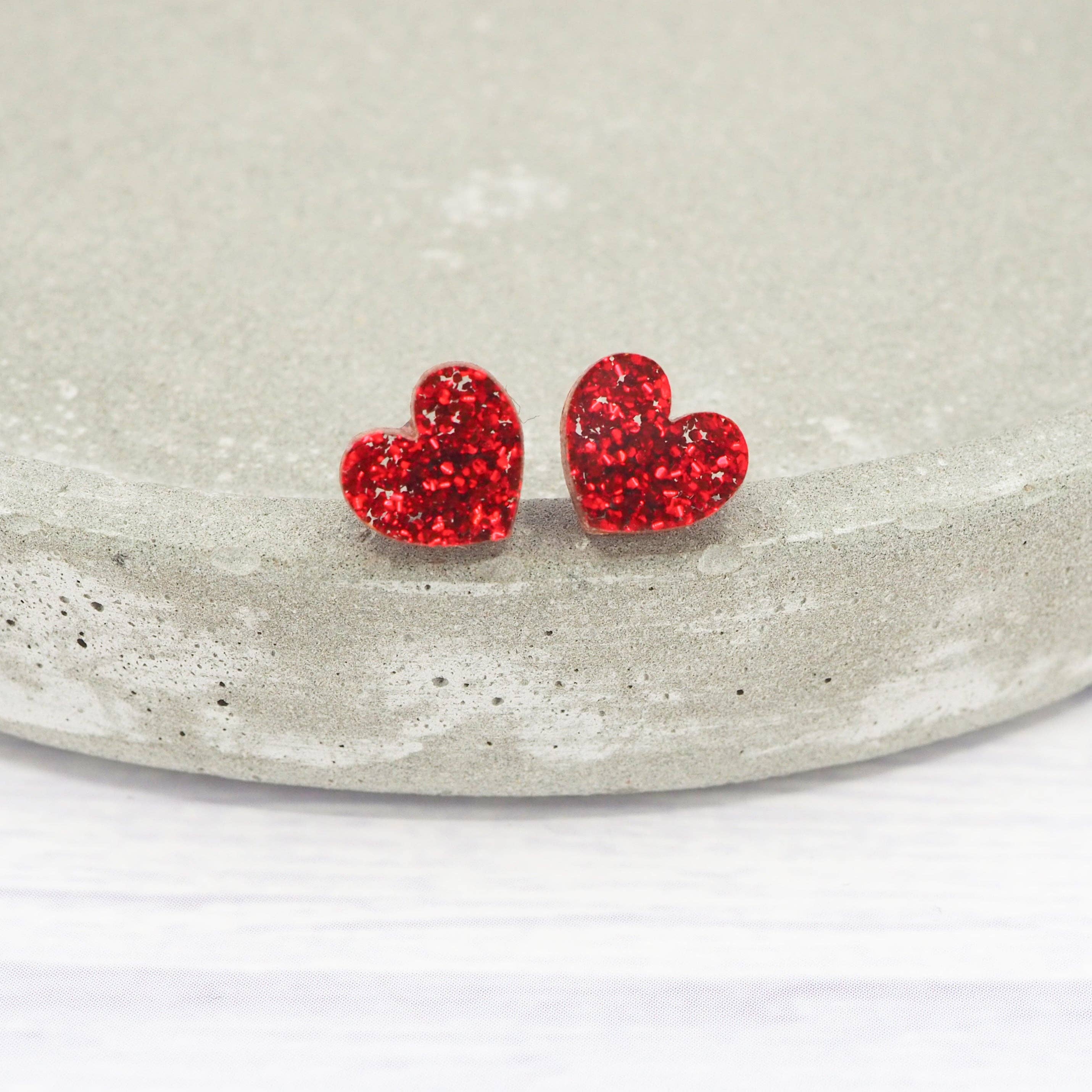 Red glitter small heart acrylic studs