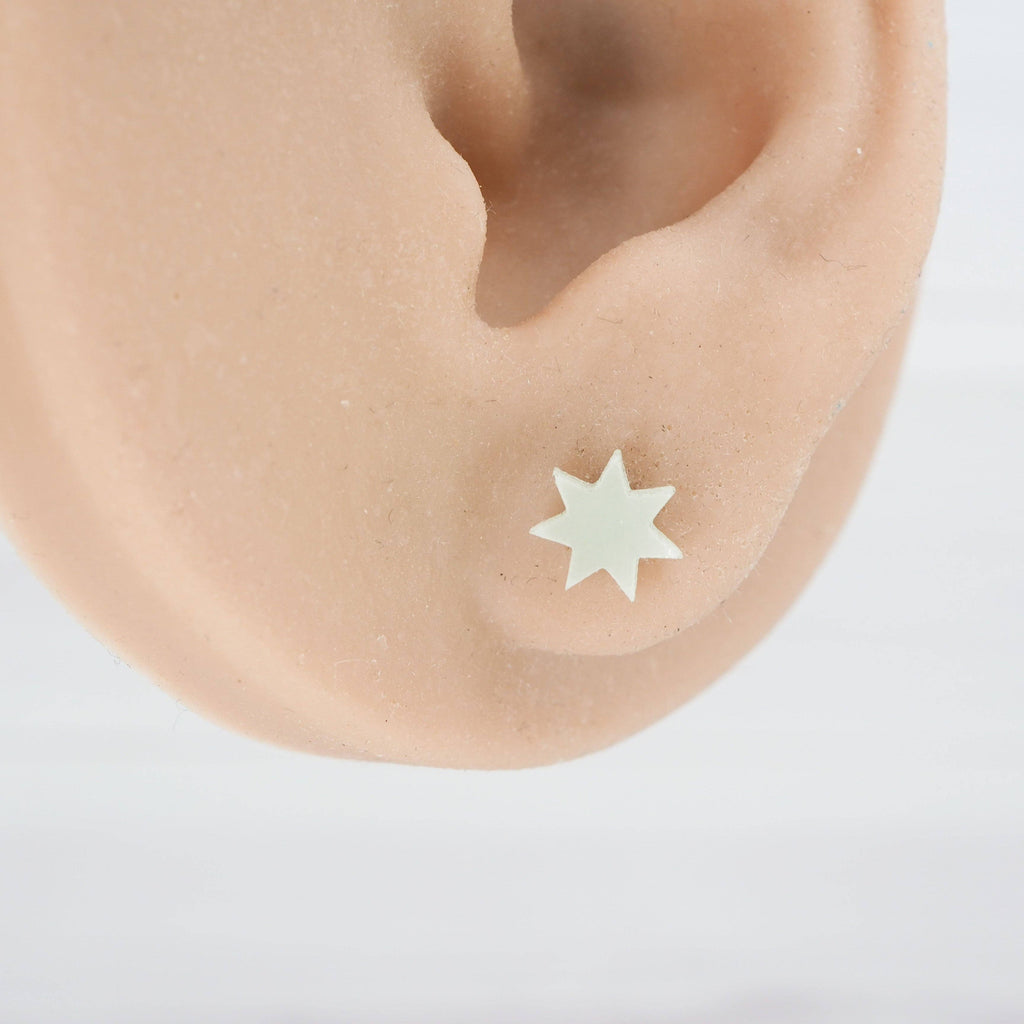 Glow in the dark 7 point star studs