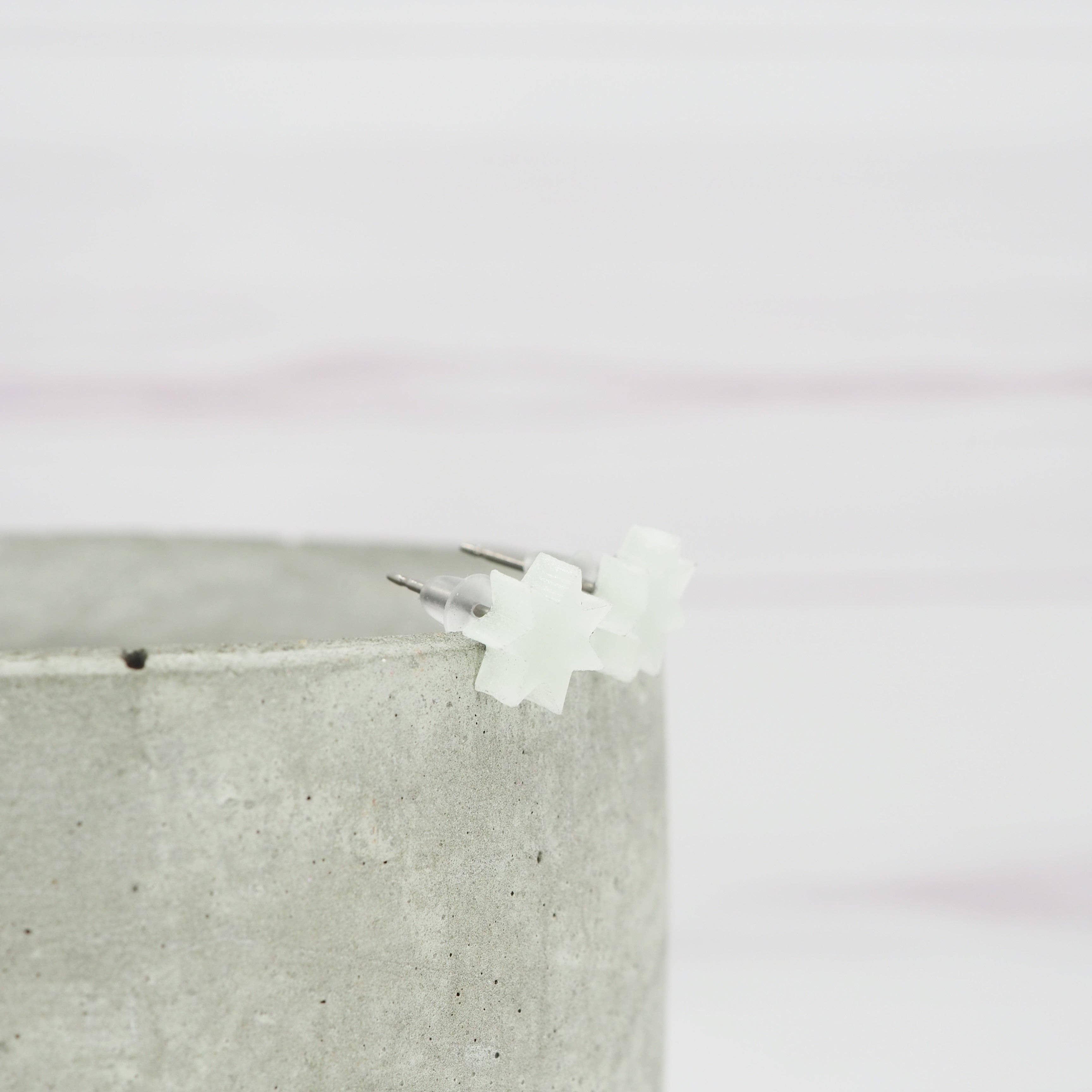 Glow in the dark 7 point star studs