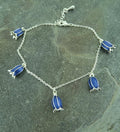Bluebell silver-plated charm bracelet flat lay - ORA Gallery