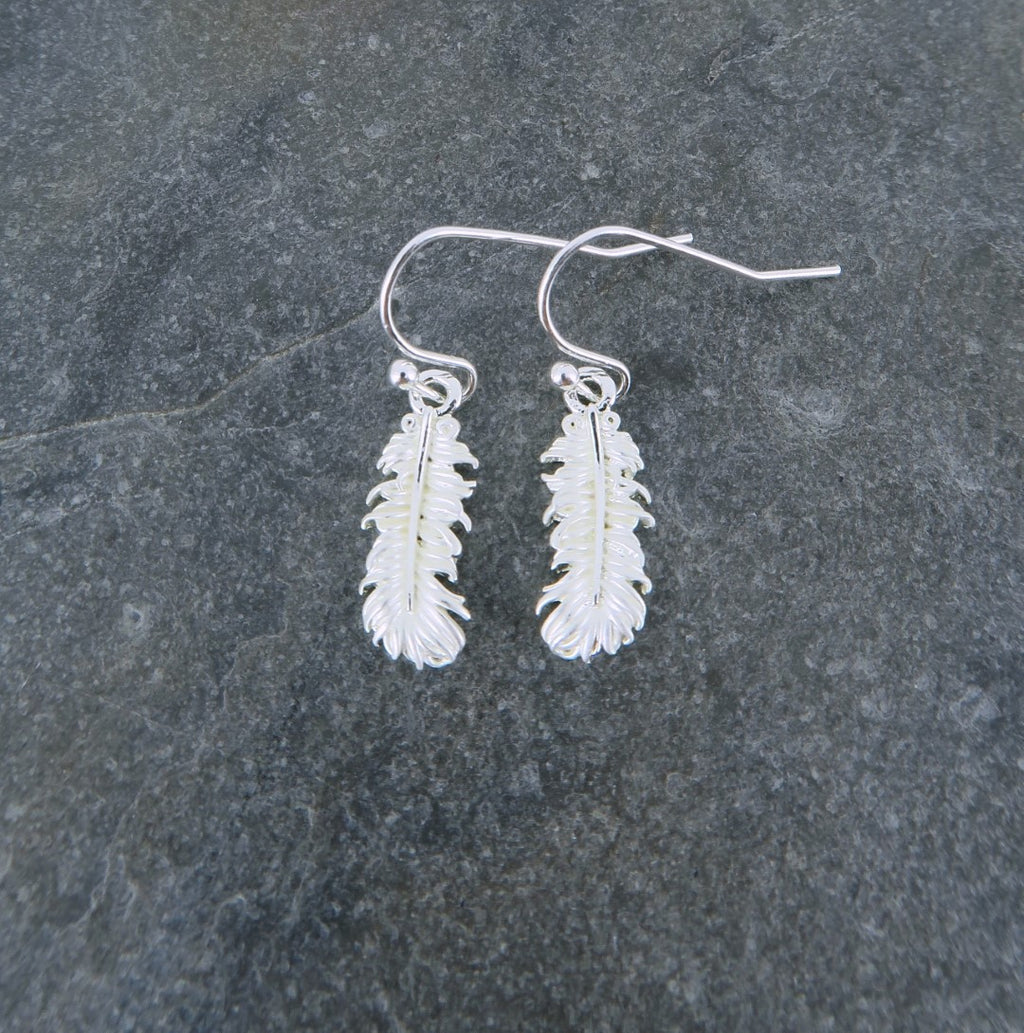 Delicate silver feather drop earring on slate - ORA Gallery
