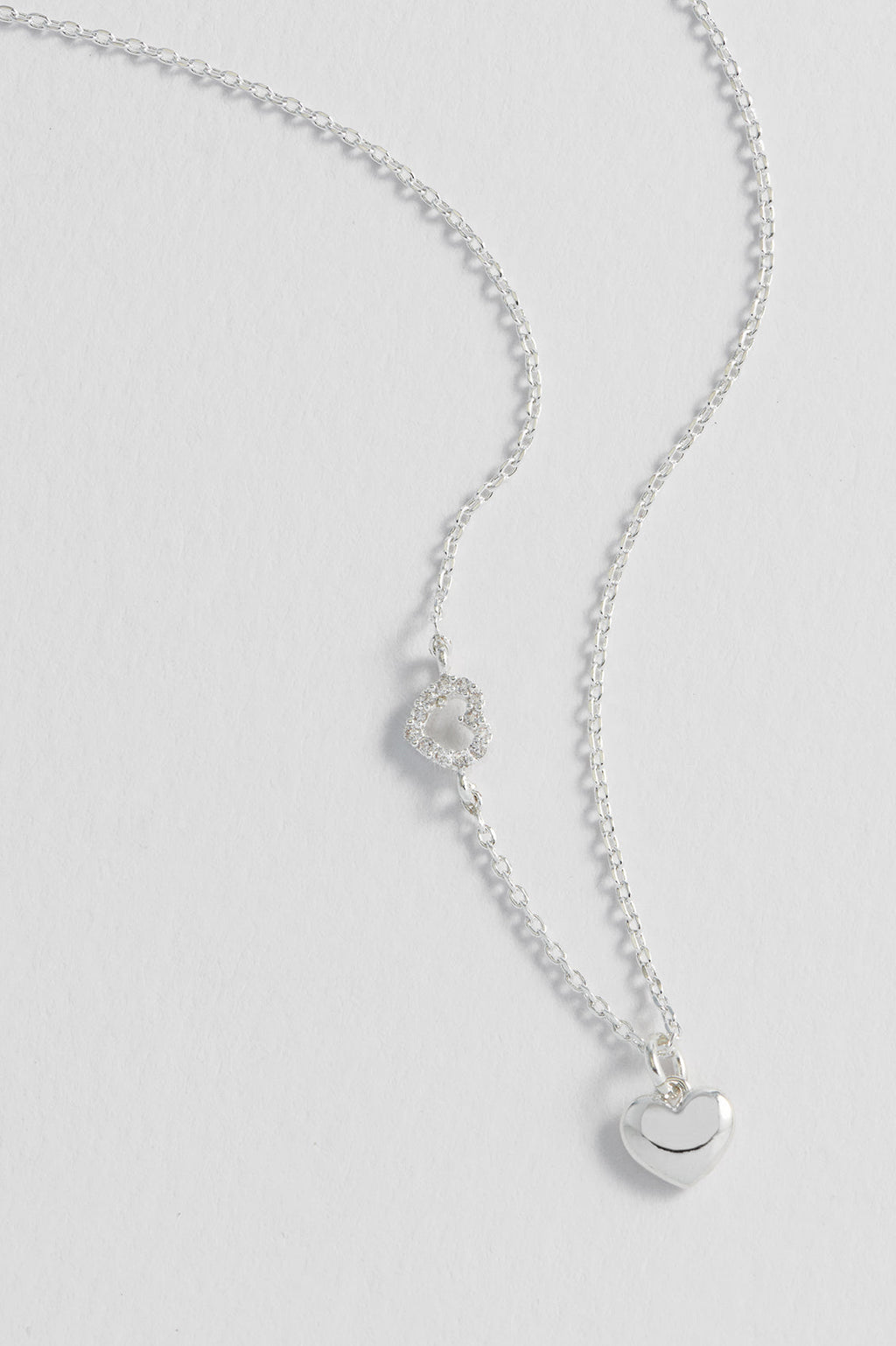 Alternative view of the silver Heart Charm With Open CZ Heart Necklace showing the adjustable chain