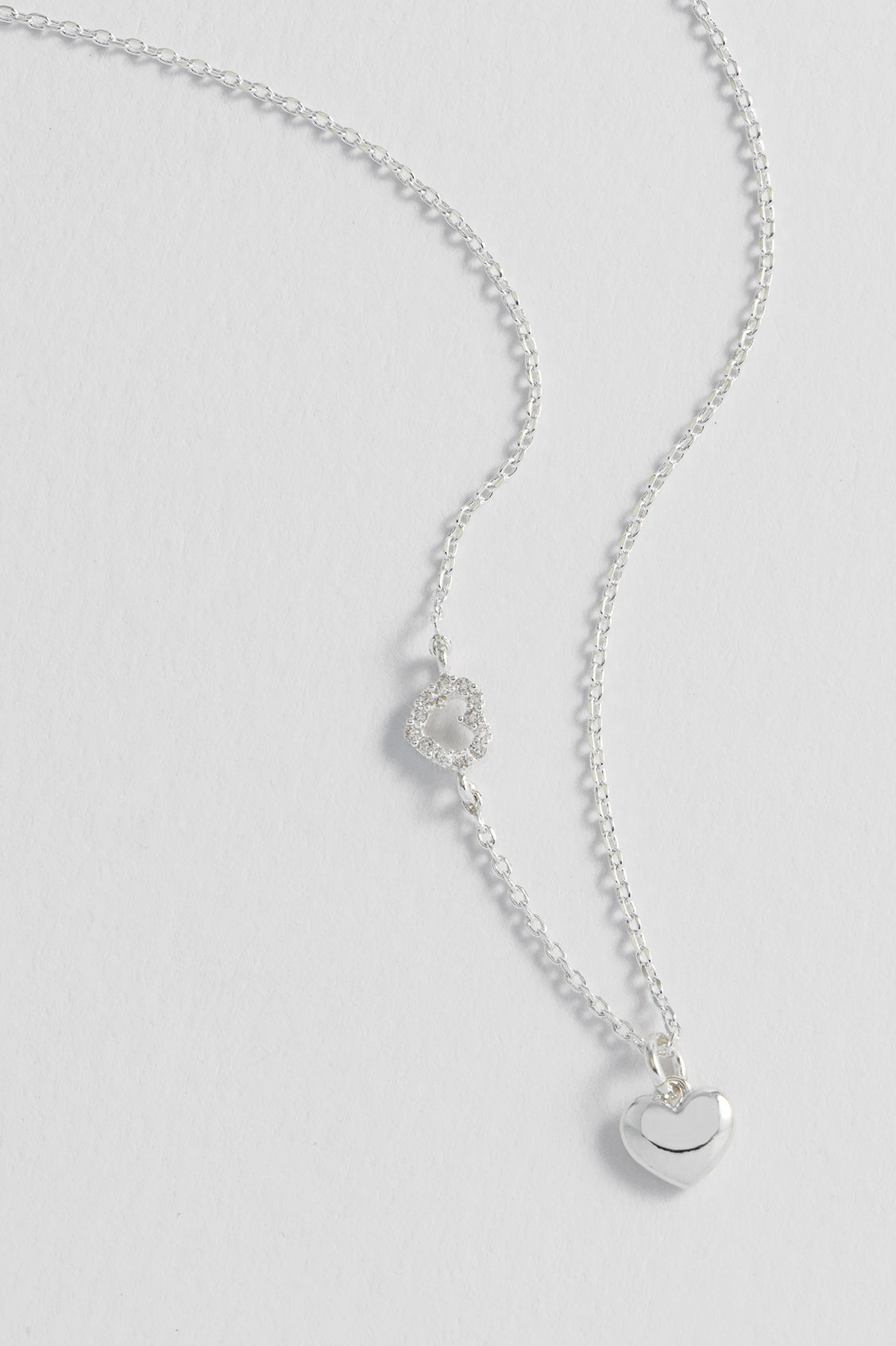 Alternative view of the silver Heart Charm With Open CZ Heart Necklace showing the adjustable chain