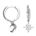 Sterling silver rhodium-plated moon and star huggie earrings with cubic zirconia
