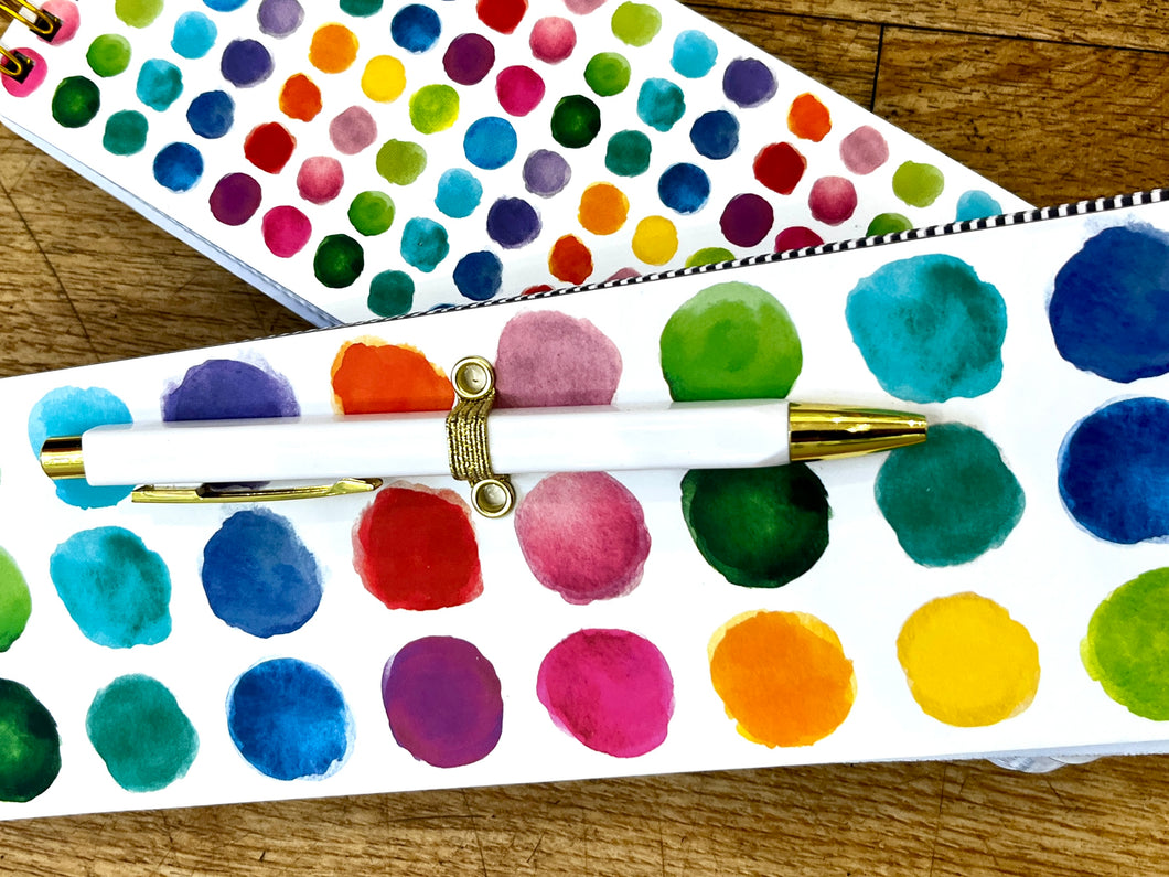 Notepad with pen