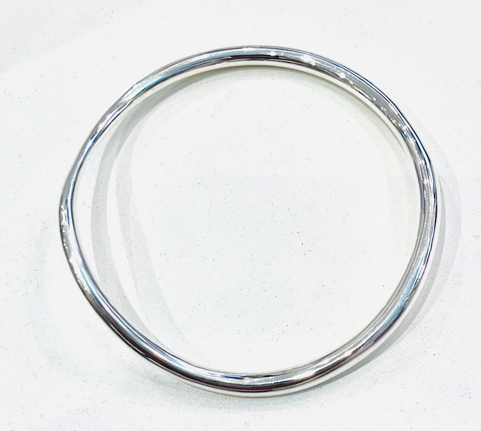 Sterling Silver Sculptural fluid Bangle by Chris Lewis