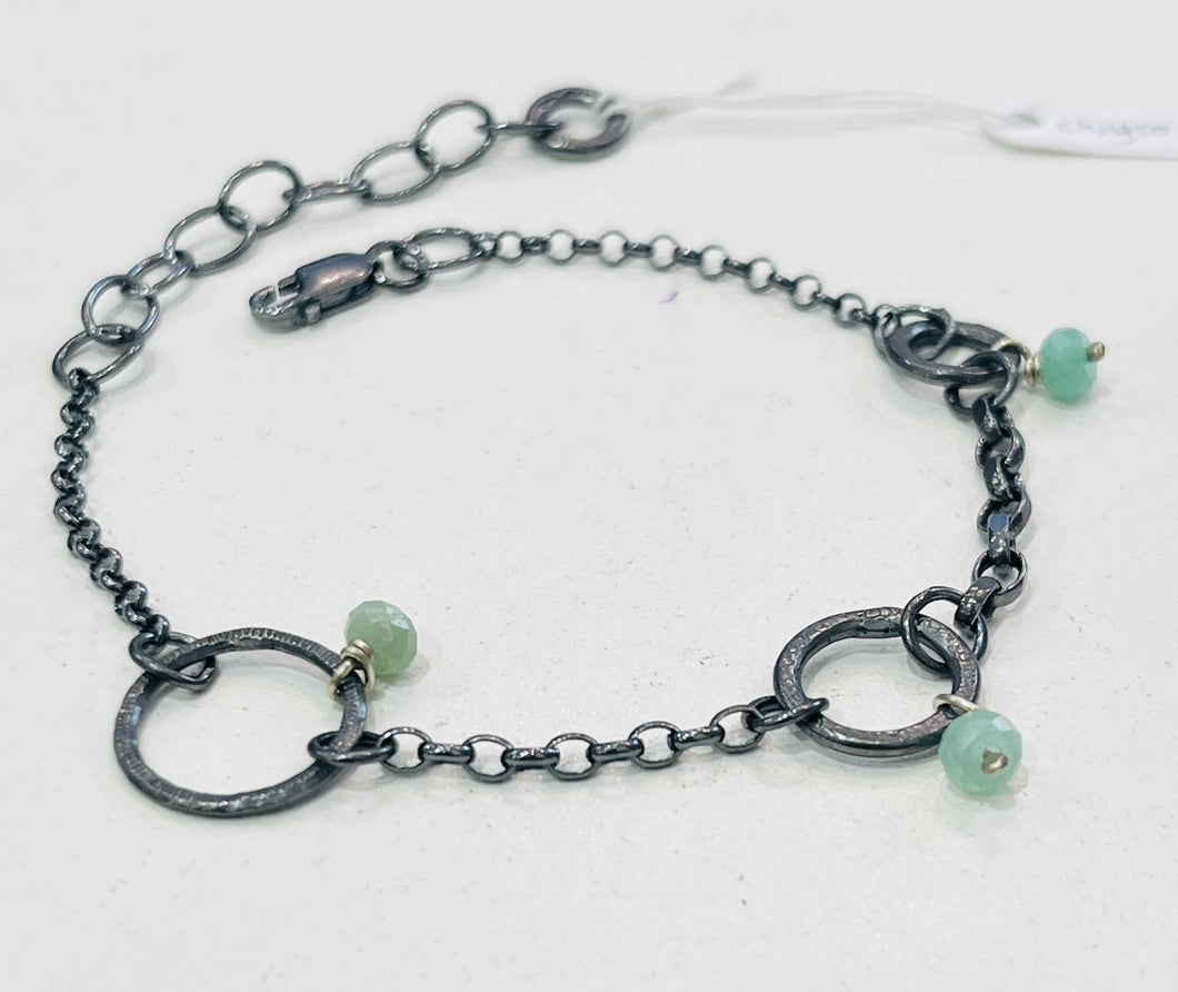 Adele Taylor handmade oxidised sterling silver bracelet with chrysoprase gemstones and hammered rings, made in Sheffield