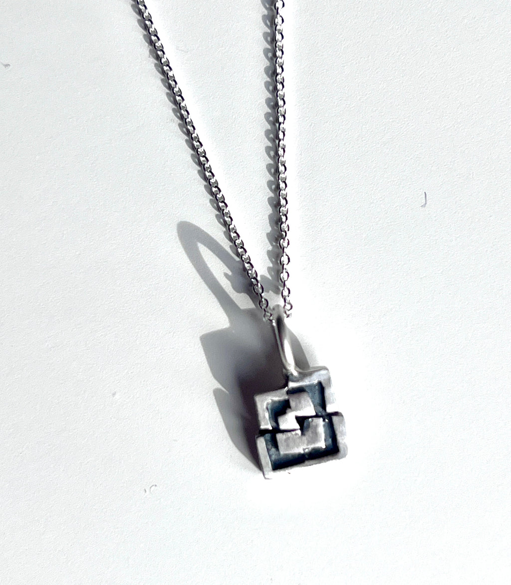 Handmade geometric sterling silver pendant by Adele Taylor Sheffield