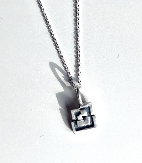 Handmade geometric sterling silver pendant by Adele Taylor Sheffield