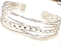 Chris Lewis  Sterling silver wound and balls bangle