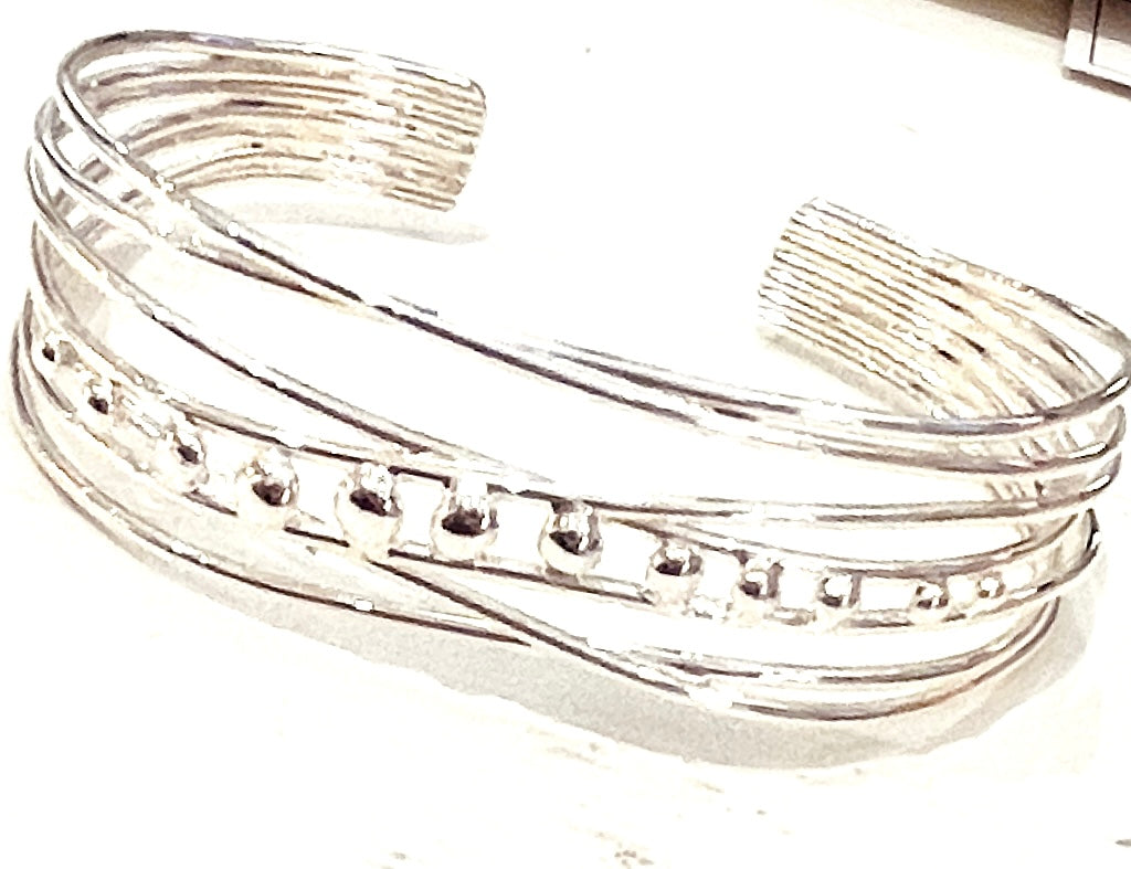 Chris Lewis  Sterling silver wound and balls bangle