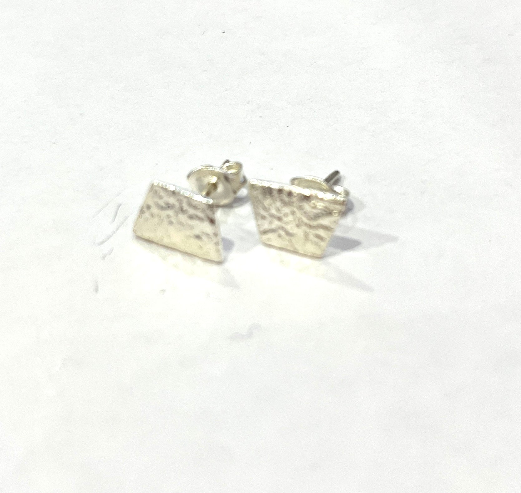 Chris Lewis studs (variety of designs)