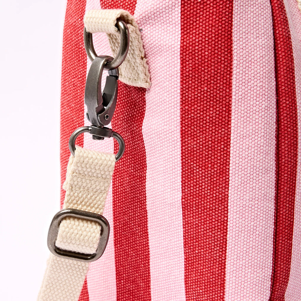 Hardware close-up — gunmetal clips and adjustable buckle
