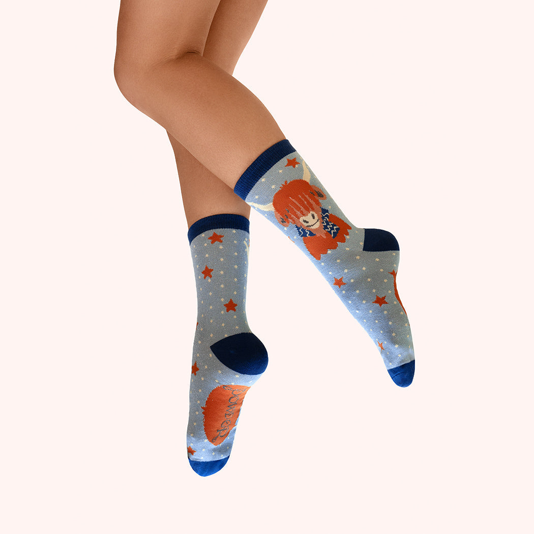 Powder Cosy Highland Cow Glitter Ankle Socks with a Highland cow in a scarf, polka dots and stars