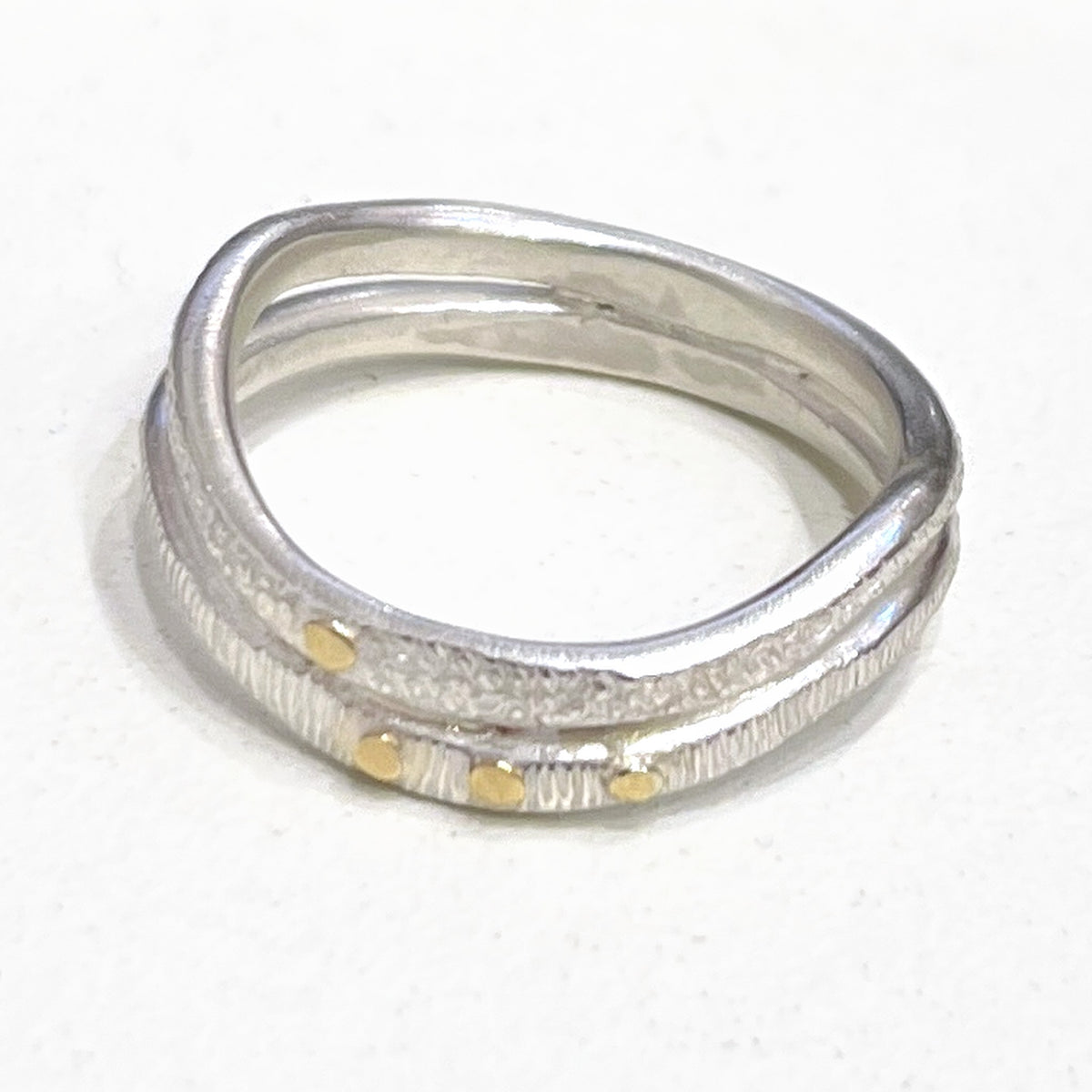 Adele Taylor double wave sterling silver ring with textured bands and gold dots
