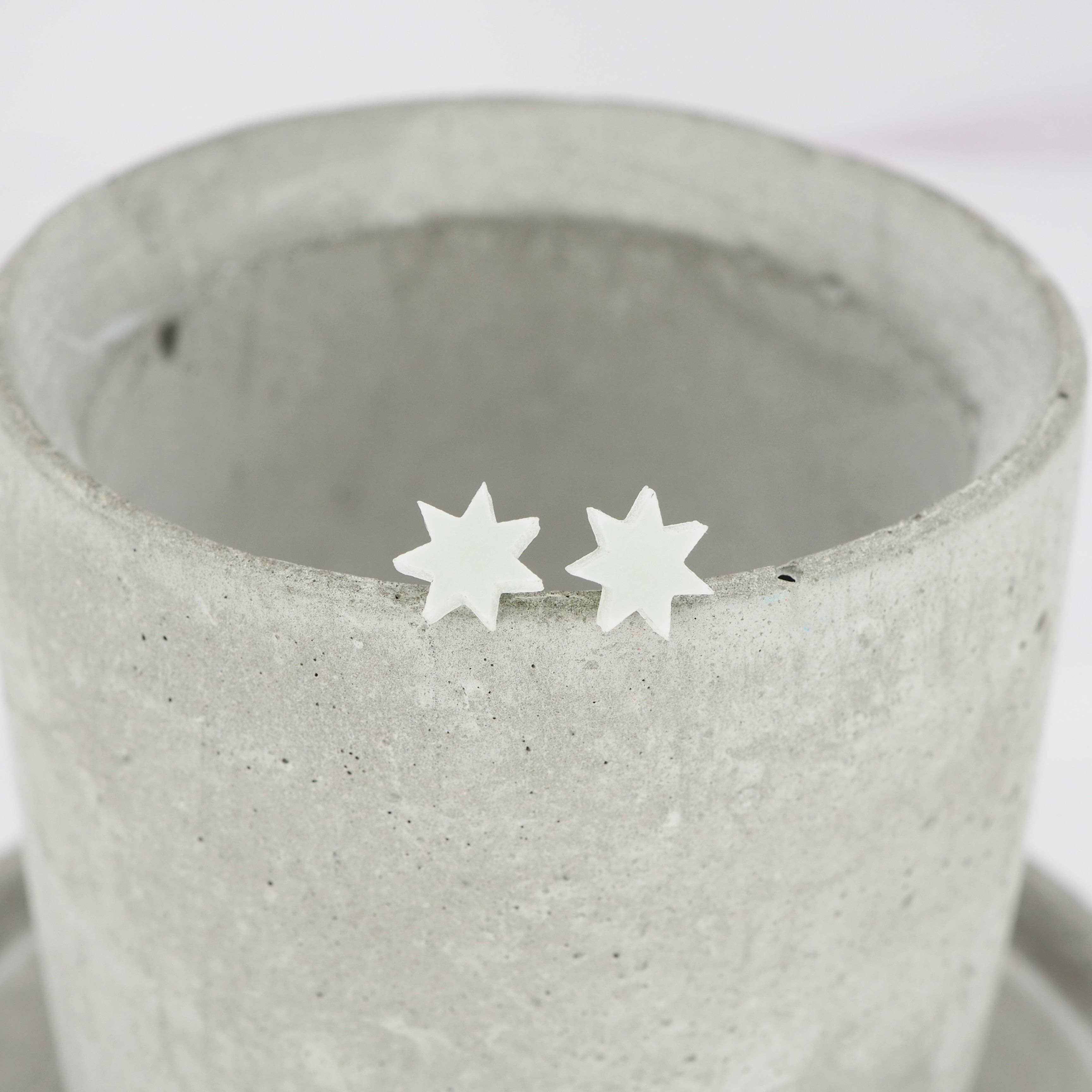 Glow in the dark 7 point star studs