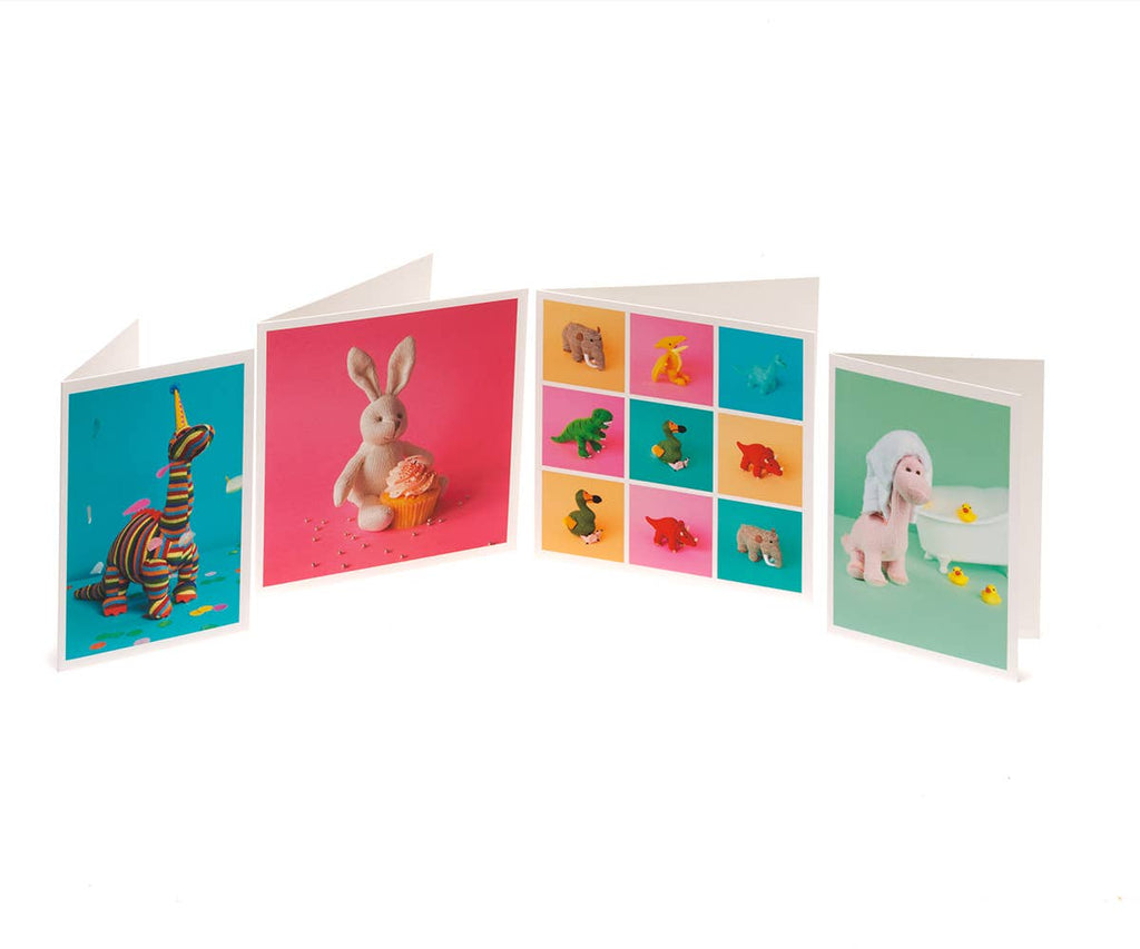 Knitted Dinosaur Toys in Grid Pattern Greetings Card