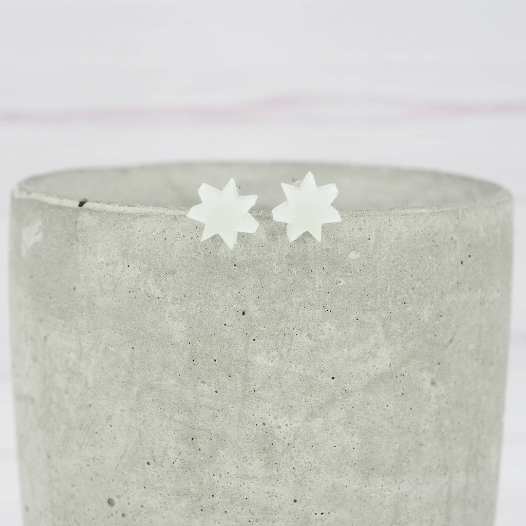 Glow in the dark 7 point star studs