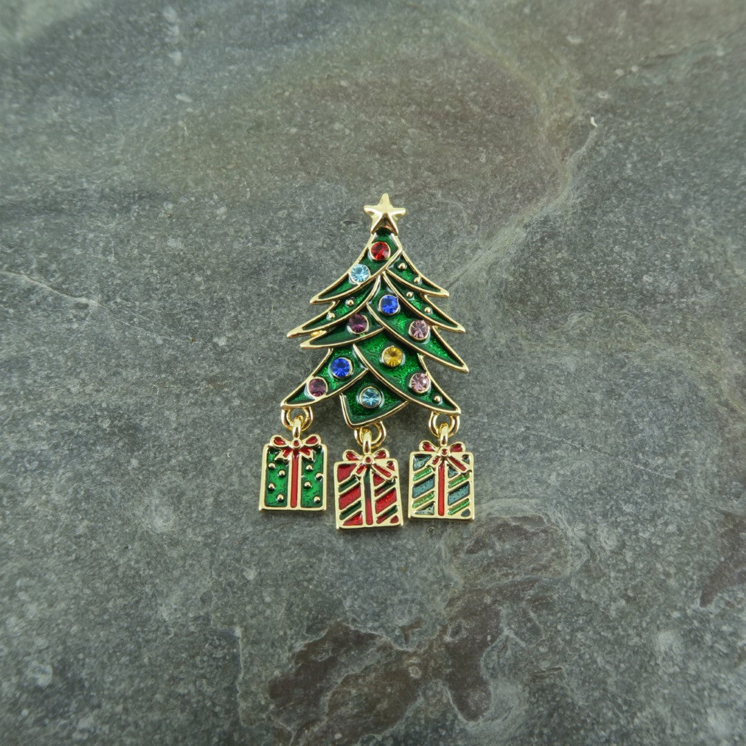 Gold Christmas tree brooch with dangly presents on slate - ORA Gallery