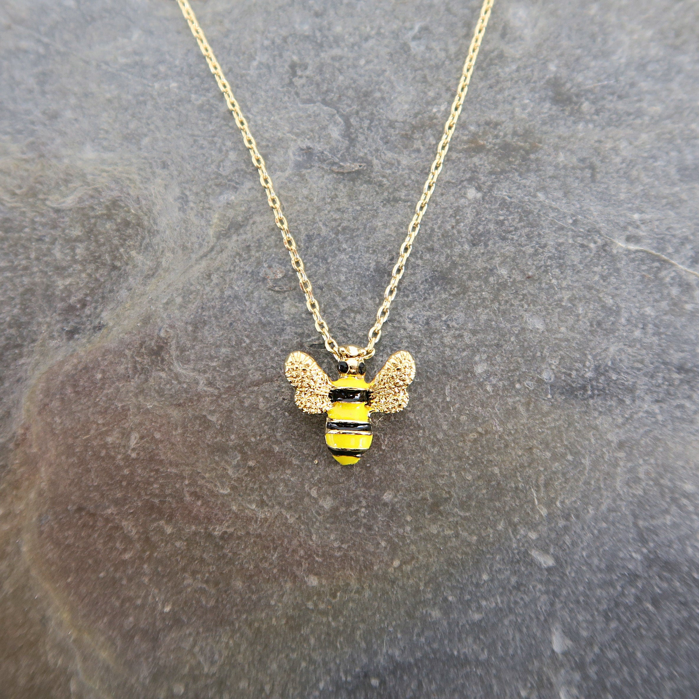 Gold bee pendant necklace detail - ORA Gallery