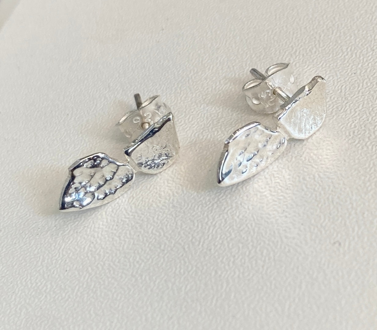 Chris Lewis studs (variety of designs)
