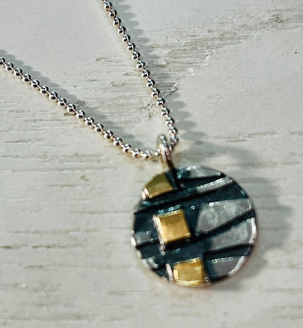 OXIDISED SILVER AND GOLD circular pendent necklace (STERLING SILVER CHAIN)